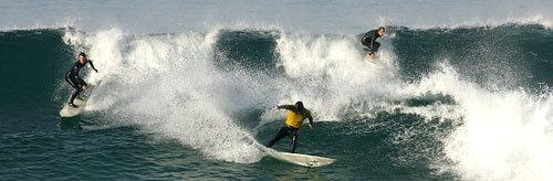 Photo of UC San Diego Students Surfing