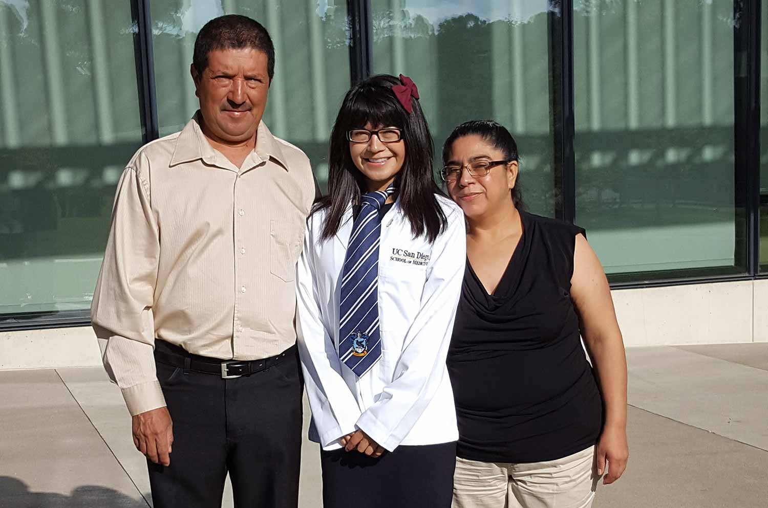 Maribel Patiño and her parents