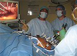 Photo of surgeons observing on a monitor the destruction of a tumor in less than ten minutes.