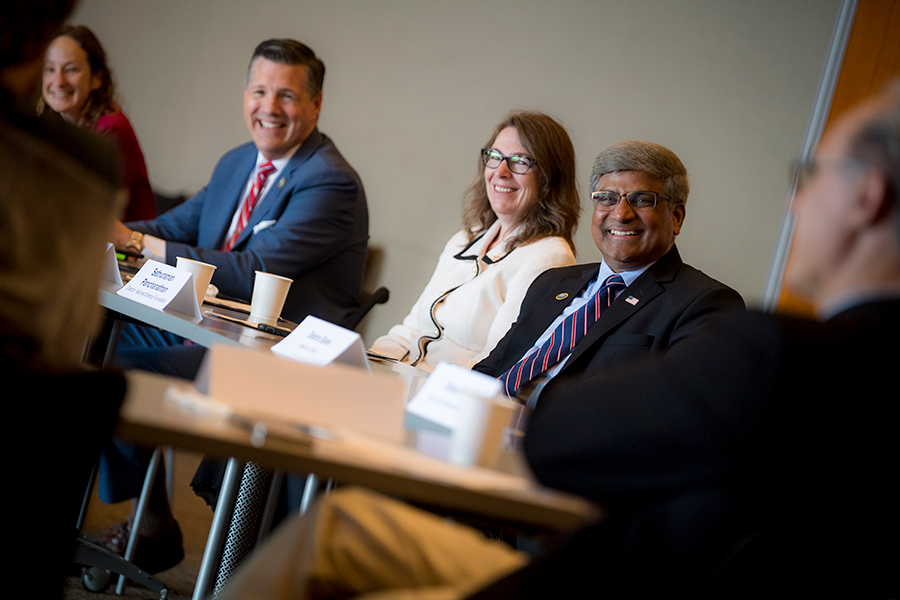 During the morning roundtable discussion of NSF early career faculty awardees and graduate fellows, NSF Chief of Staff Brian Stone, Vice Chancellor for Research Corinne Peek-Asa and Panchanathan share a laugh during a presentation.
