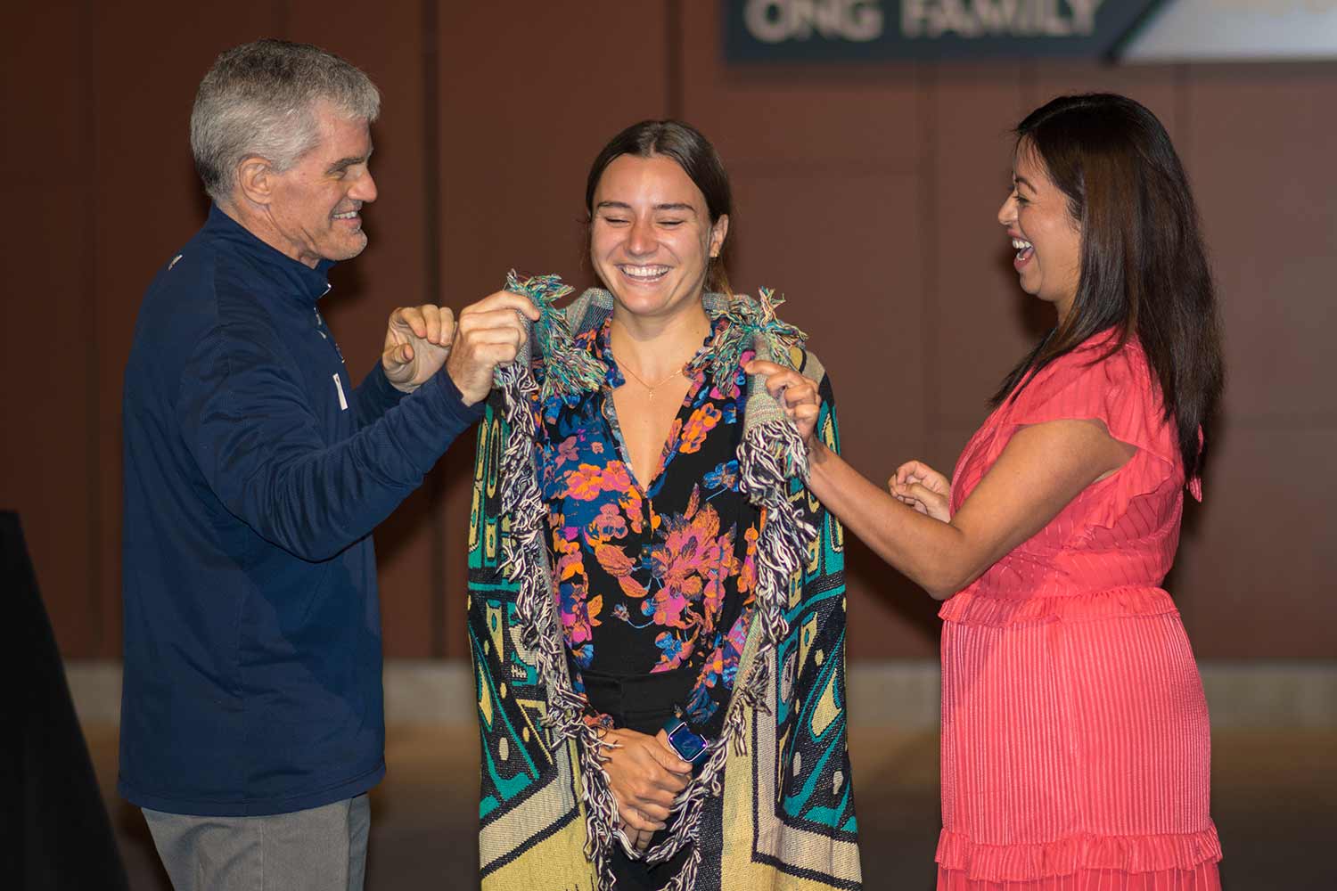 Native American faculty members wrapped second-year medical student Brianna Irons in her Blanket of Knowledge.